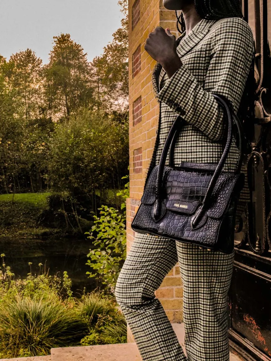 Colette M Alligator